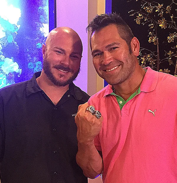 Aquatic Contractors owner Brian Hoover with Johnny Damon